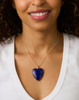 Model wearing a blue lapis heart pendant