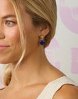 Model wearing the love you to the moon and stars earrings