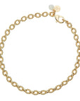 Gold chunky link chain necklace features twisted links, oversized clasp, and mother of pearl bead