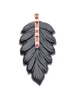 Carved onyx feather pendant with gold bail accented with pink sapphire and pink tourmaline stones