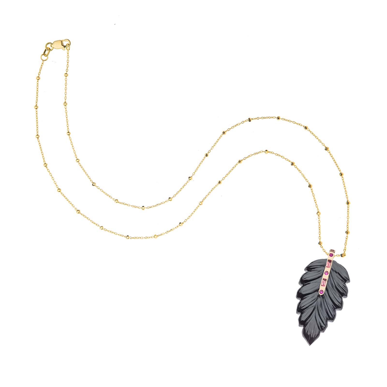 Carved onyx feather pendant on 18 inch 14 karat satellite chain
