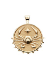 Gold original Cancer coin pendant features a crab with a star