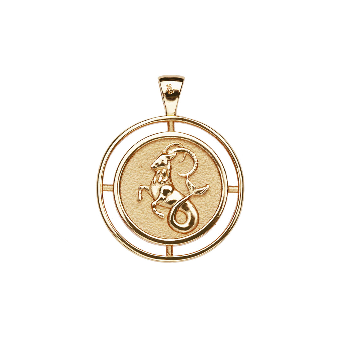 Gold coin pendant with the sea goat that represents the Capricorn zodiac sign