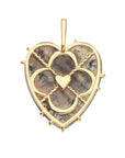Back of labradorite heart pendant shows gold setting that features heart detail in the center of quatrefoil shape