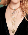 Model wearing various petite embellished coins