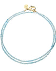 Double wrapped aquamarine beaded necklace with oversized gold lobster clasp