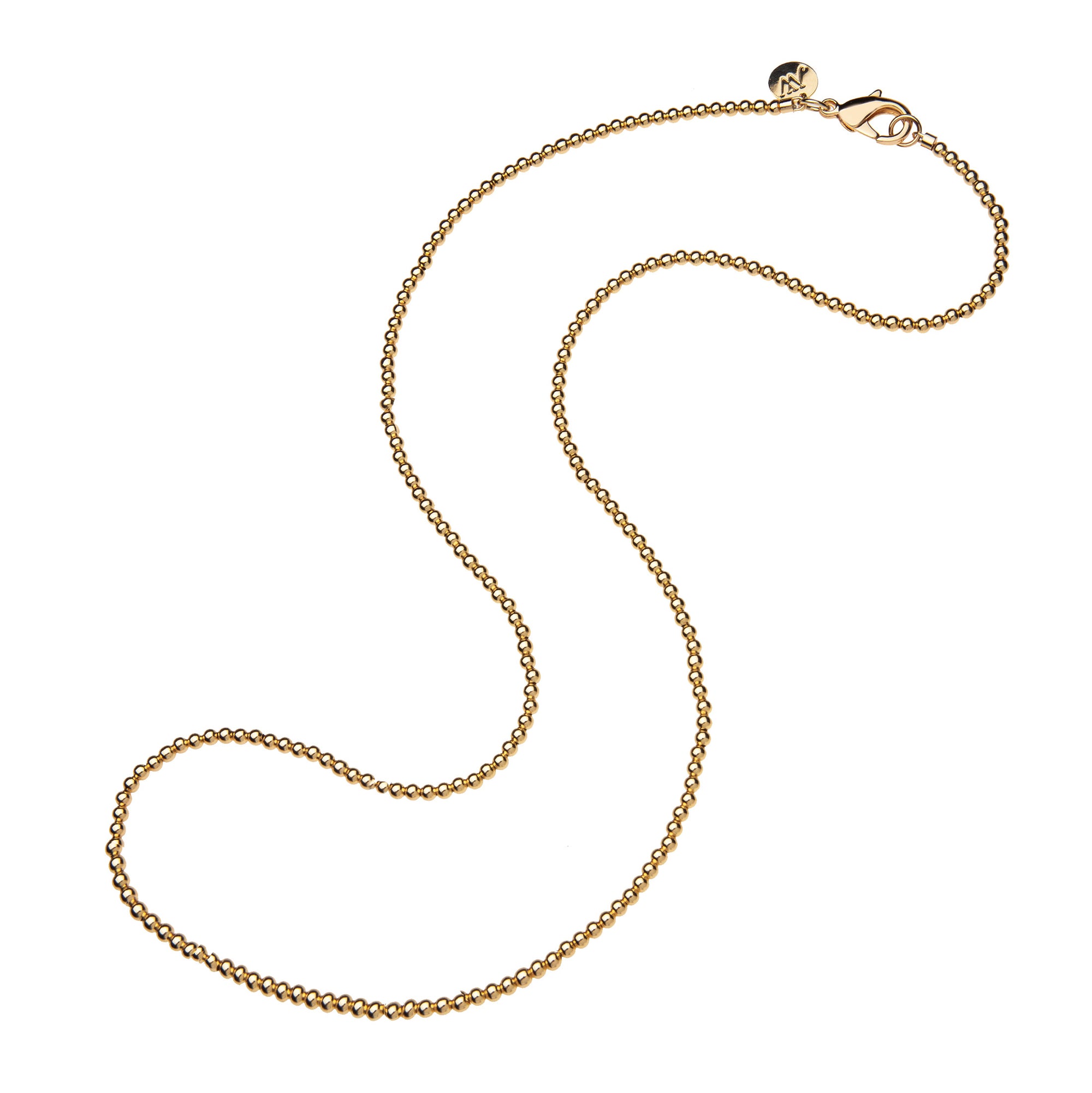 Gold beaded necklace with oversized lobster clasp
