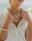 Gold Coins Layered on Model