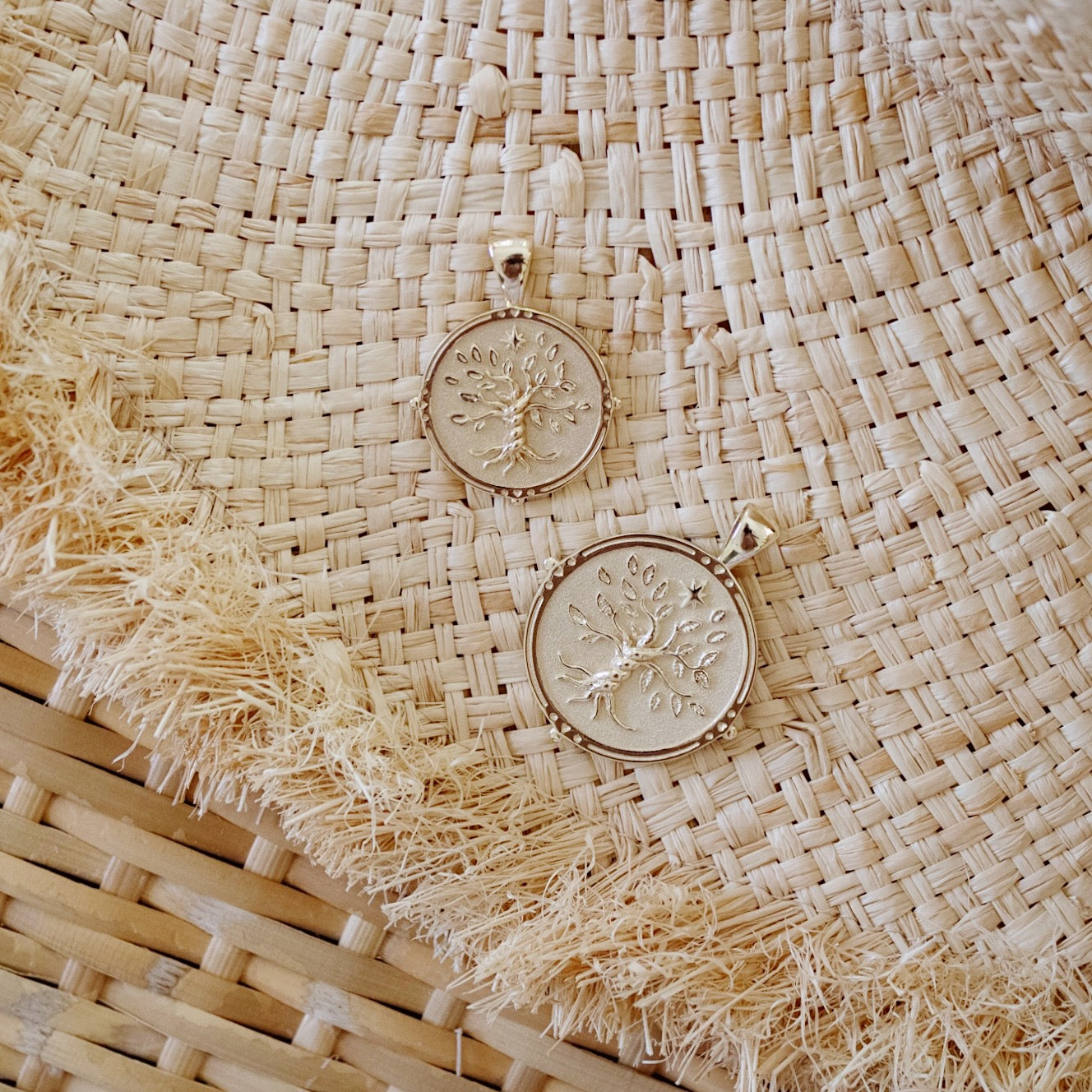 Small and Original Size Gold Faith coins styled on a woven surface