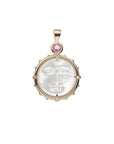 Gold pendant with carved mother of pearl moon face and pink tourmaline stone on bail