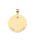 Back of gold carved sundial pendant features star detail and the phrase TIME FLIES