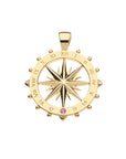 Gold cutout coin pendant with sundial motif and pink sapphire and white topaz accents