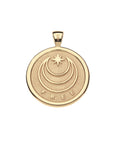 Back of gold coin pendant features moon and star logo with the word FREE