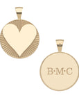 Front of gold engravable heart coin and blank back of coin featuring sample engraving