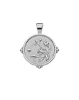 Silver coin pendant featuring morning glory design