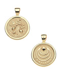 Front of gold coin pendant features a branch with lemons and lemon blossoms and the phrase "LA PLUS BELLE FLEUR" and back of pendant features moon and star logo with the word "GRATITUDE"