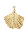 Gold ginkgo leaf pendant features row of white topaz stones down the center of the leaf and white topaz accents on the bail