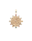 Gold coin pendant with four quadrants of flowers and border of pink tourmaline, white topaz, sky blue topaz, amethyst, peridot, and citrine stones