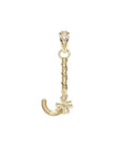 Gold letter J pendant with flower detail and white topaz accents on the bail