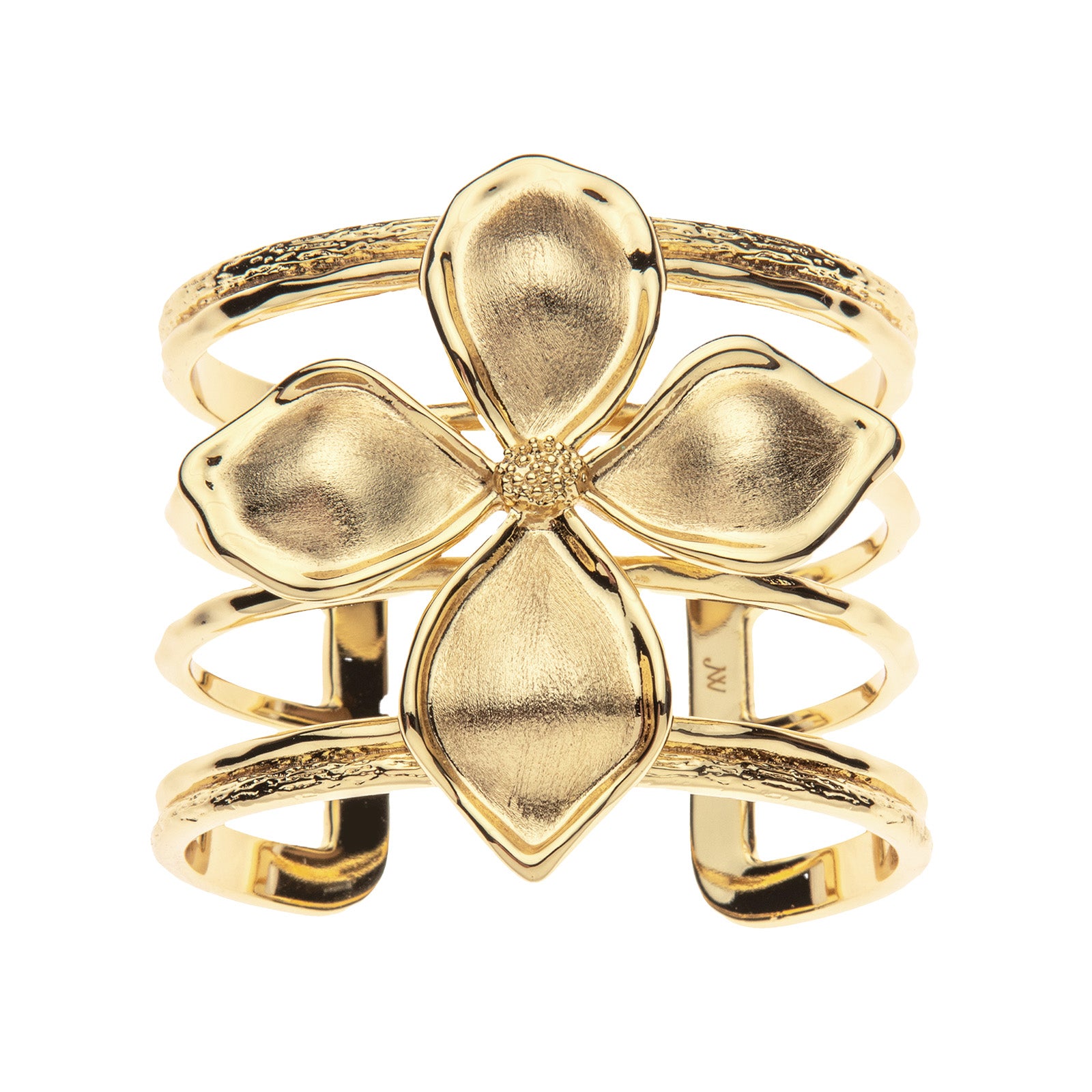 Gold cuff bracelet featuring dogwood flower