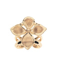 Gold ring with dogwood flower