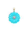 Carved turquoise daisy with pink tourmaline center set in gold