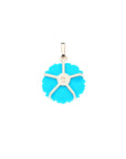 Back of turquoise cherry blossom shows gold setting