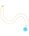Carved cherry blossom on 14 karat satellite chain