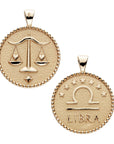 Gold original Libra coin pendant features balanced scales holding hearts on one side and the Libra symbol with stars above it and "Libra" written underneath on the other side