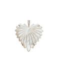 Mother of pearl carved palm heart in gold setting with white topaz detail on bail