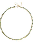Gold tennis necklace featuring heart shaped olive green CZ stones