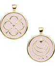 Gold Coin Pendant with Quatrefoil and heart illustration (front) and moon and star logo with the word LOVE (back) filled in with pale pink enamel
