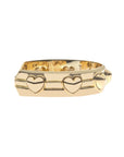 Side view of gold cuff with hearts