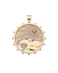 Gold coin pendant with illustration of the rays of the sun, waves, and a pink tourmaline heart with other pink tourmaline accents