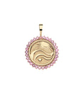 Gold coin pendant with border of pink tourmaline stones features illustration of the rays of the sun, waves, and a heart