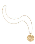 Gold love, courage, and strength coin on classic rolo chain