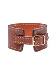 Back view of brown leather cuff show adjustable buckle closure