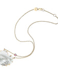 Carved mother of pearl heart pendant with pink tourmaline accent on chain