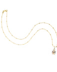 Gold ladybug pendant on 14 karat satellite chain