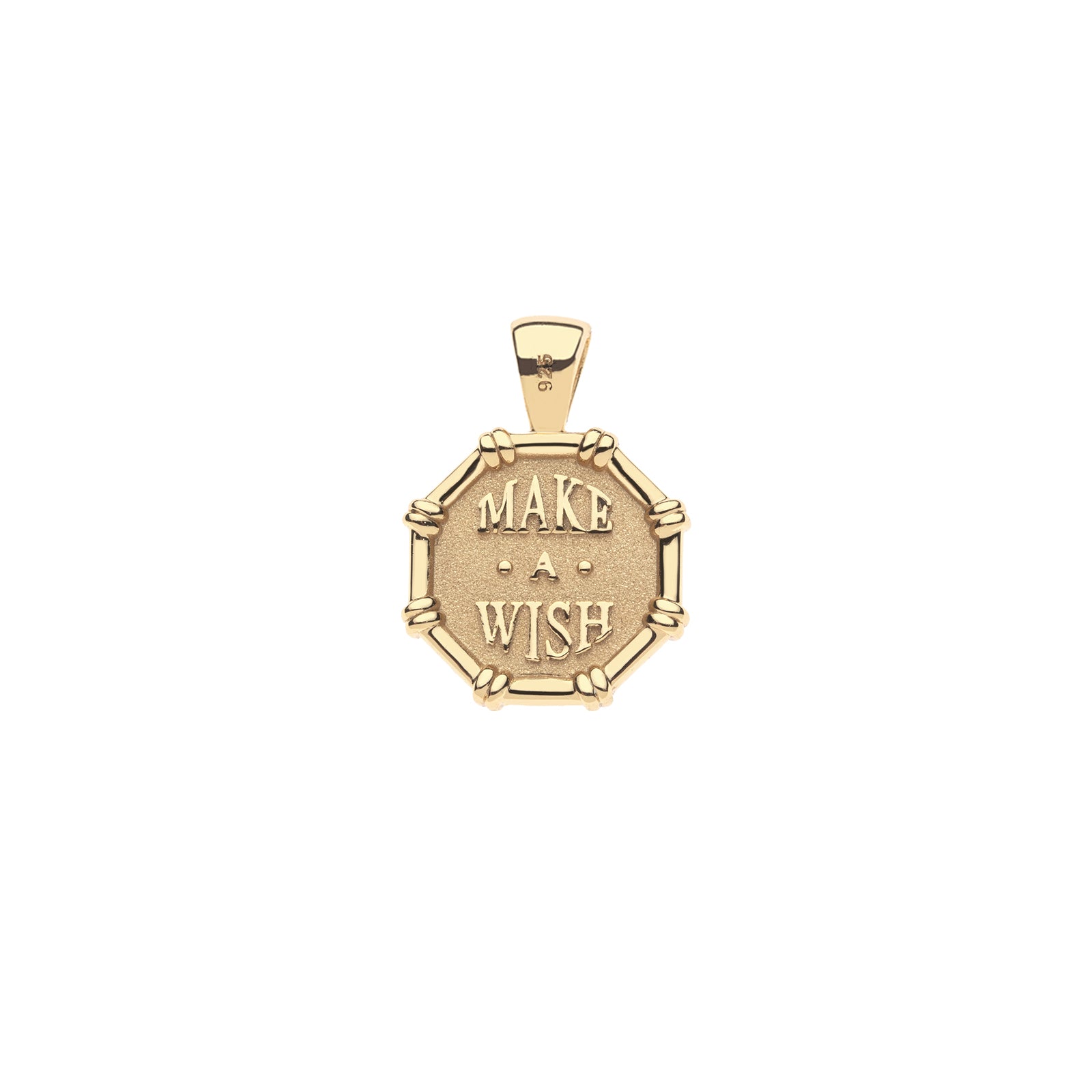 Back of gold birthstone pendant features the words "make a wish"