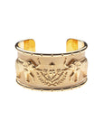 Gold cuff bracelet with symmetrical design of elephants with flowers and star in the center