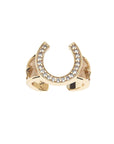 Gold horseshoe ring with white topaz stones