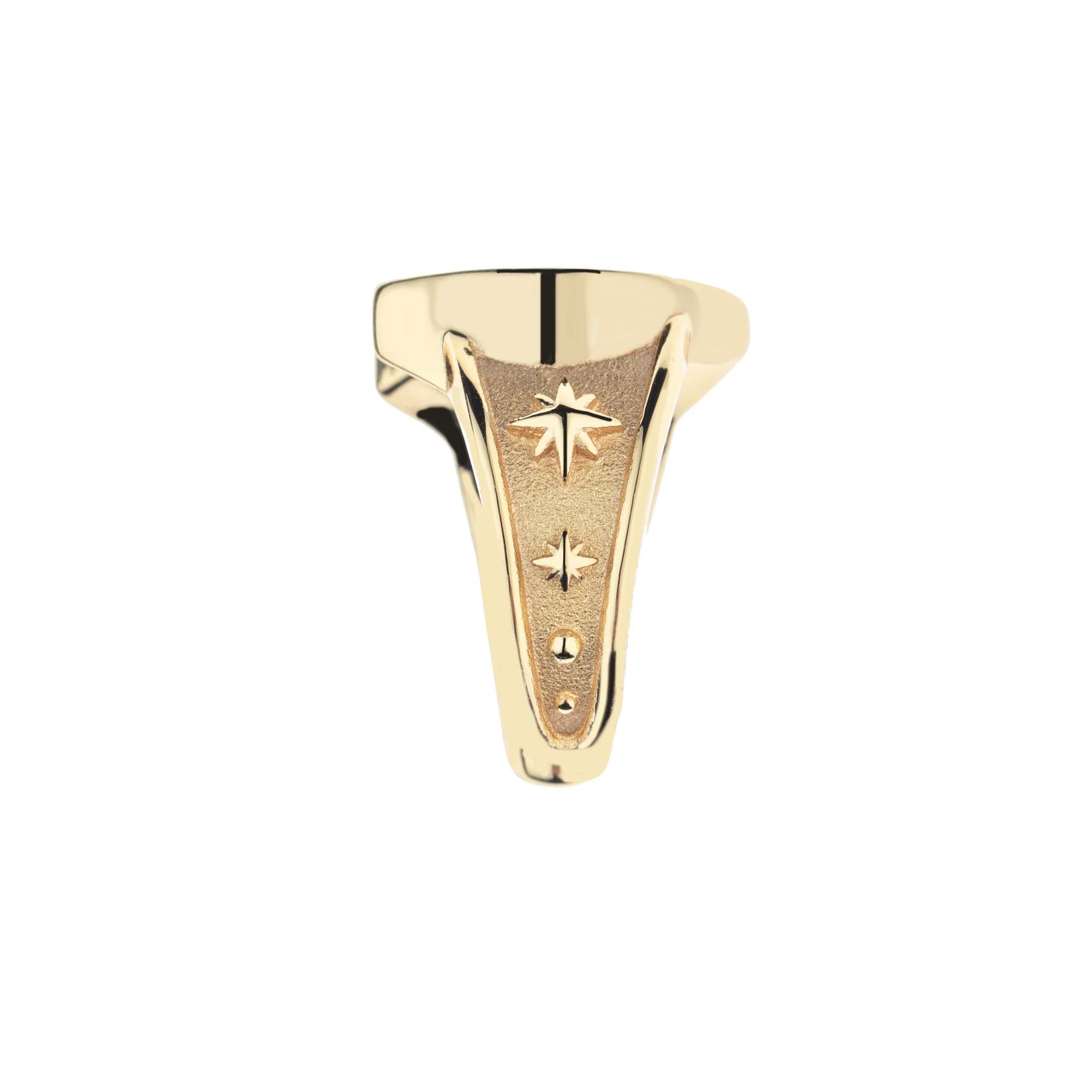 Side view of gold horseshoe ring shows star details