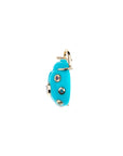 Side view of carved turquoise ladybug