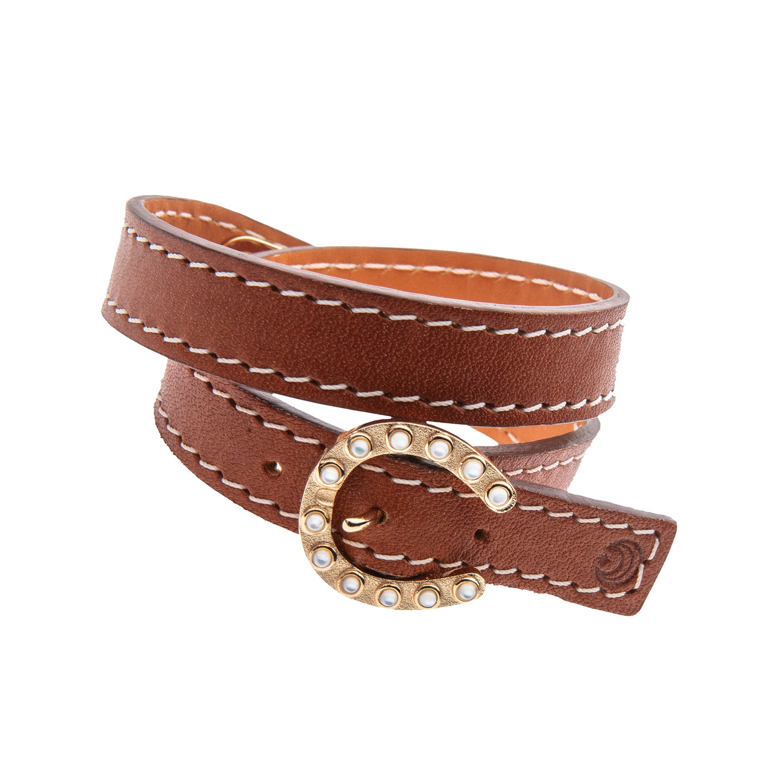 Back of brown leather wrap bracelet shows horseshoe buckle closure with mother of pearl accents