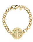Chunky link gold bracelet features double sided coin with the words BONNE CHANCE on one side