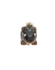 Carved rabbits face featuring white topaz eyes set in gold
