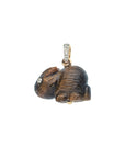 Carved tigers eye rabbit pendant with white topaz eyes and gold and white and gold topaz bail