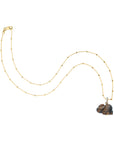 Carved rabbit pendant on 14 karat beaded satellite chain
