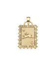 Gold club playing card pendant features embellished edge with peridot and white topaz and leaping bunny motif in the center